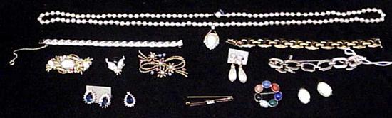 Designer costume jewelry including: