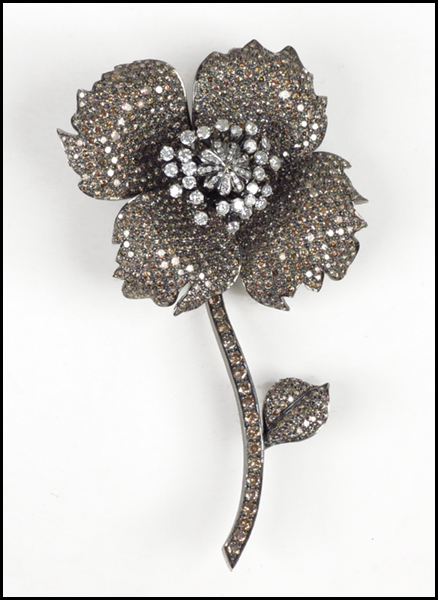 DIAMOND AND 14 KARAT GOLD FLOWER