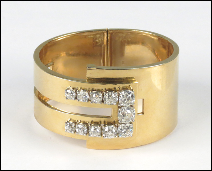 DIAMOND AND 18 KARAT YELLOW GOLD