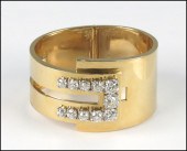 DIAMOND AND 18 KARAT YELLOW GO