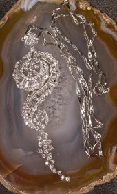 DIAMOND AND EIGHTEEN KARAT GOL