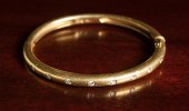 DIAMOND AND EIGHTEEN KARAT GOL