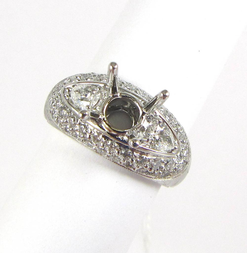 DIAMOND AND EIGHTEEN KARAT GOLD