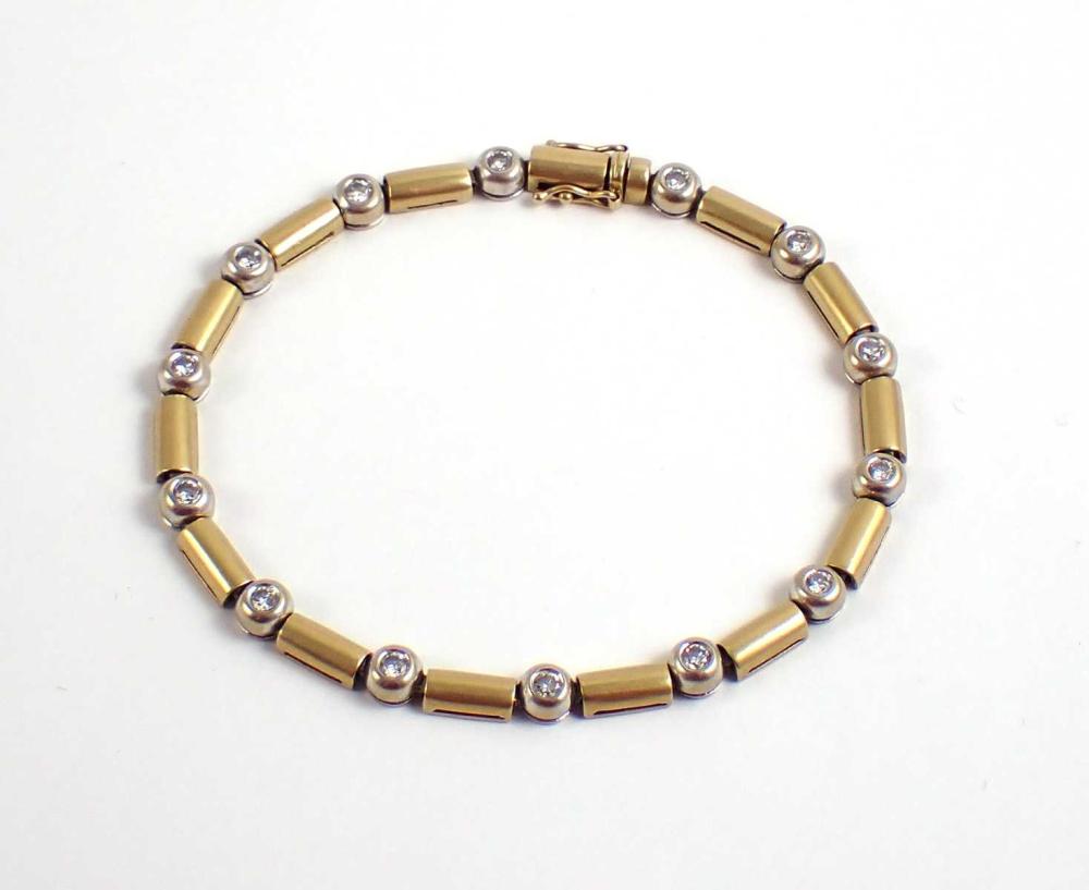 DIAMOND AND EIGHTEEN KARAT GOLD