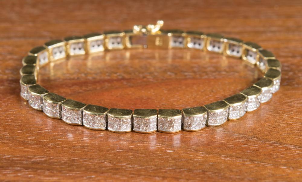 DIAMOND AND EIGHTEEN KARAT GOLD