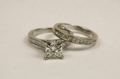 DIAMOND AND EIGHTEEN KARAT GOL