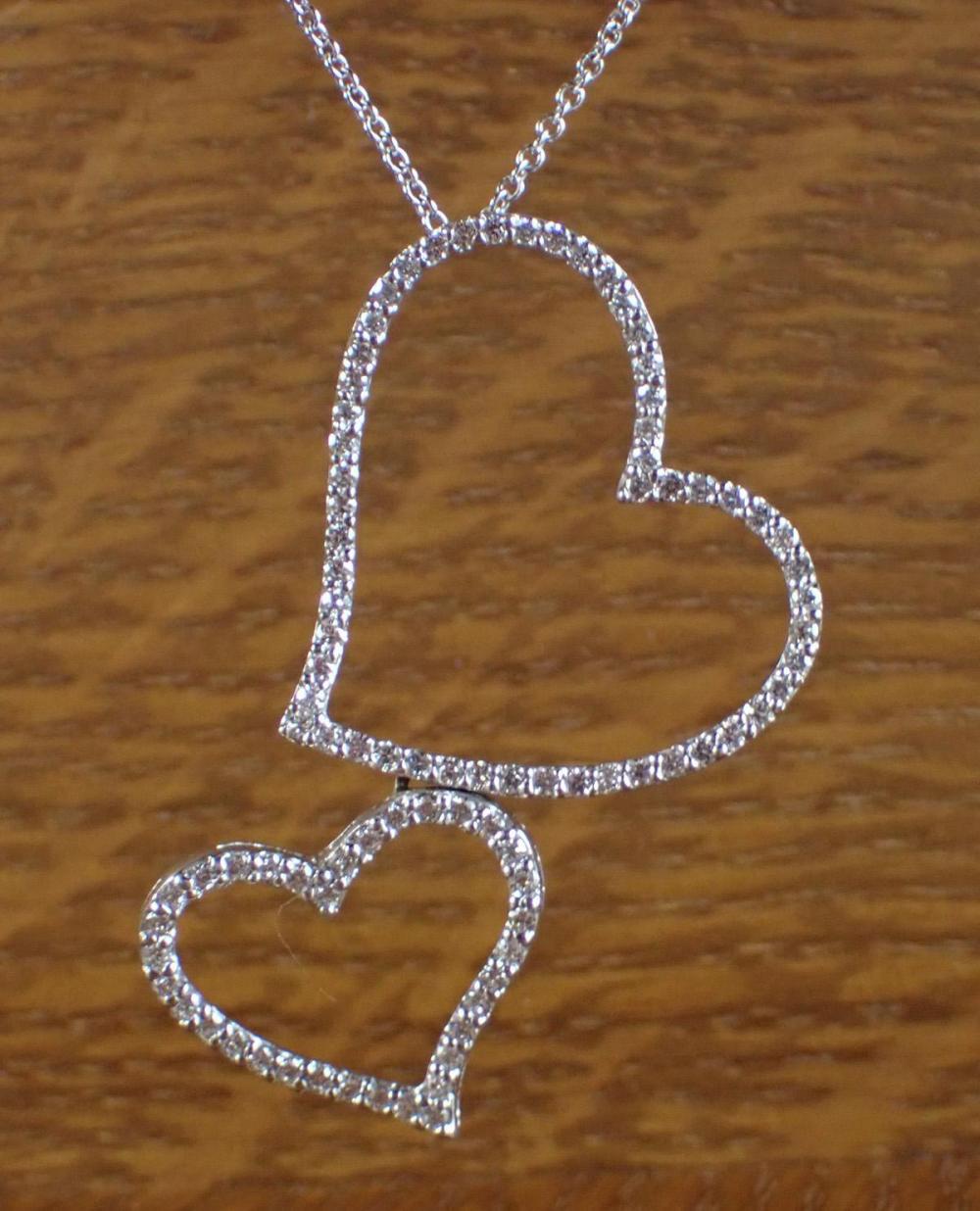 DIAMOND AND EIGHTEEN KARAT GOLD