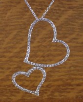 DIAMOND AND EIGHTEEN KARAT GOL