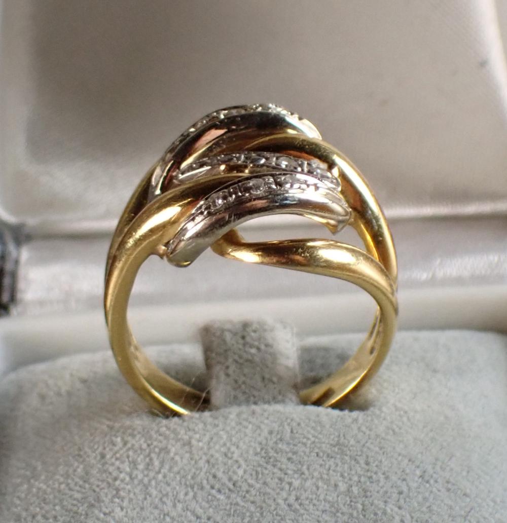 DIAMOND AND EIGHTEEN KARAT TWO-TONE