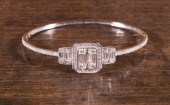 DIAMOND AND EIGHTEEN KARAT WHI