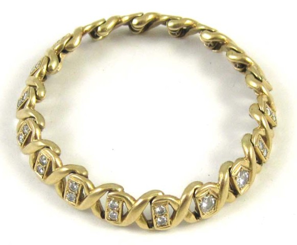 DIAMOND AND FOURTEEN KARAT GOLD