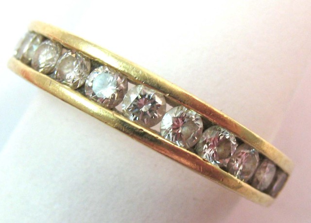 DIAMOND AND FOURTEEN KARAT GOLD