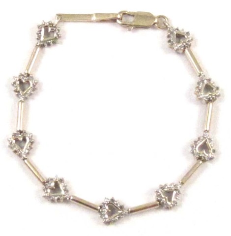 DIAMOND AND FOURTEEN KARAT GOLD