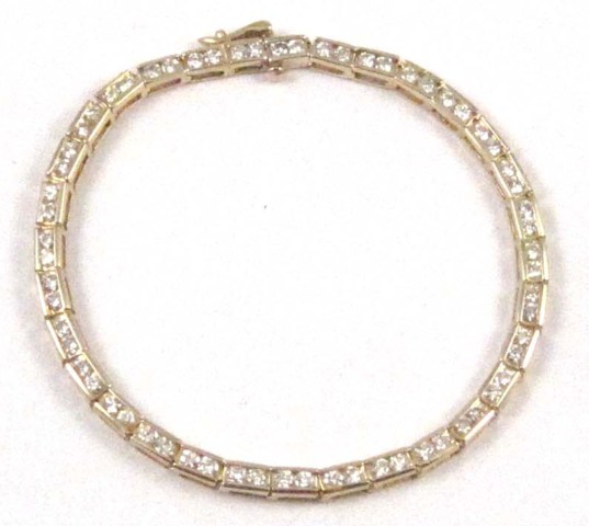 DIAMOND AND FOURTEEN KARAT GOLD