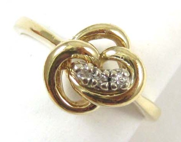 DIAMOND AND FOURTEEN KARAT GOLD