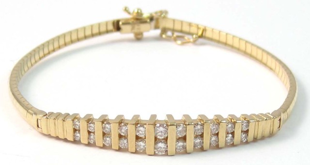 DIAMOND AND FOURTEEN KARAT GOLD