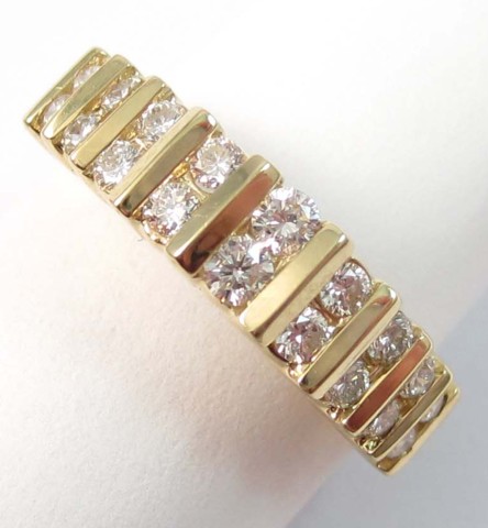 DIAMOND AND FOURTEEN KARAT GOLD