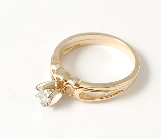 DIAMOND AND FOURTEEN KARAT GOLD