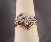 DIAMOND AND FOURTEEN KARAT GOL