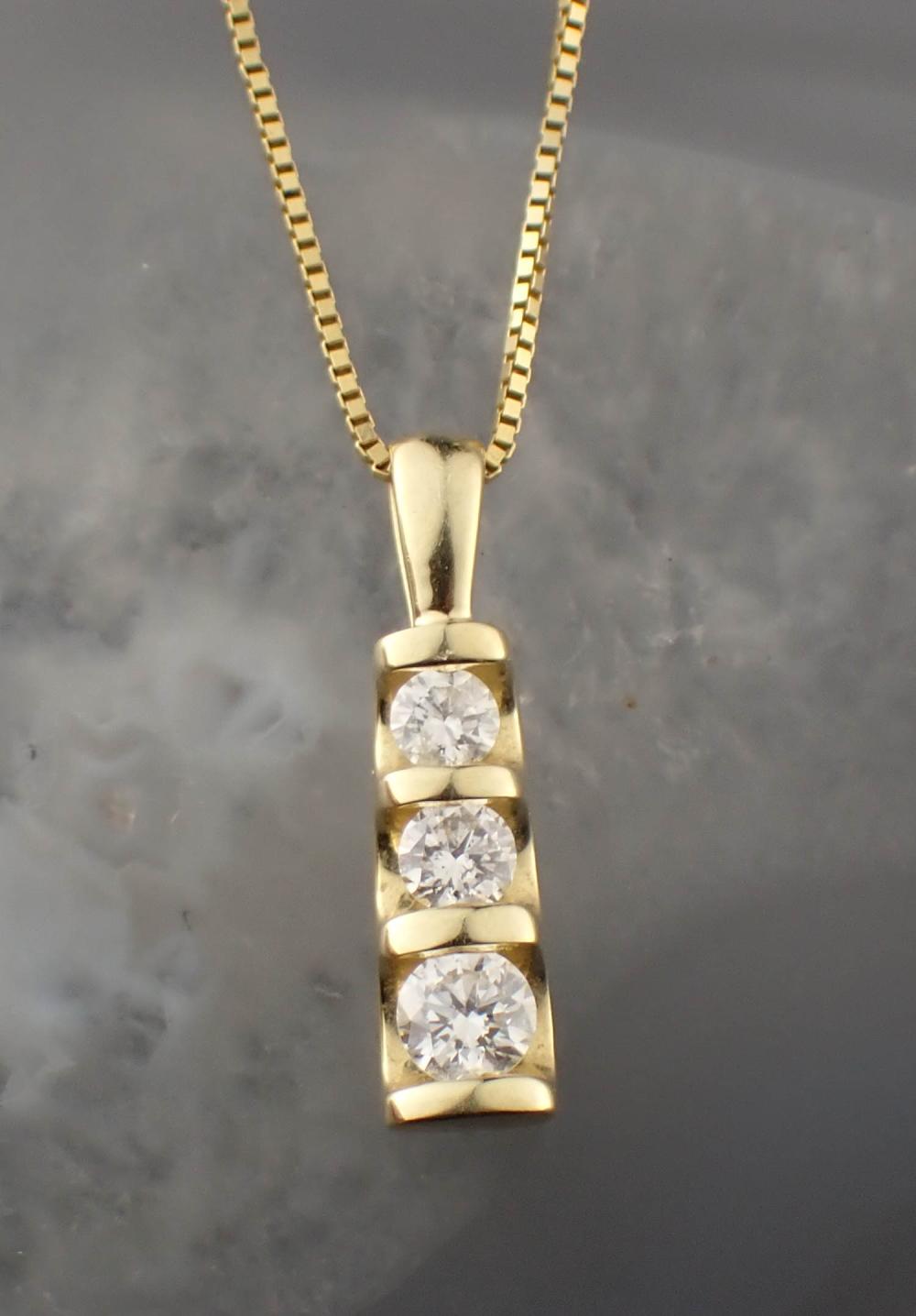 DIAMOND AND FOURTEEN KARAT GOLD