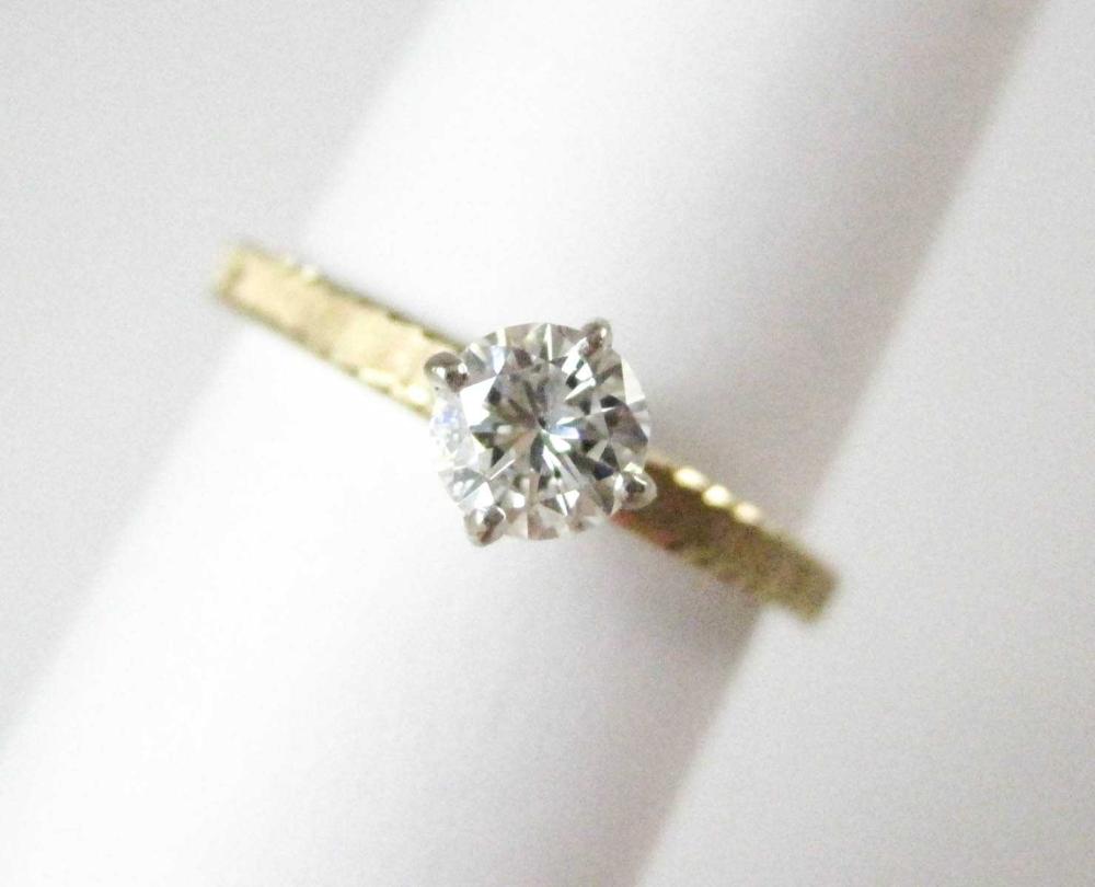 DIAMOND AND FOURTEEN KARAT GOLD