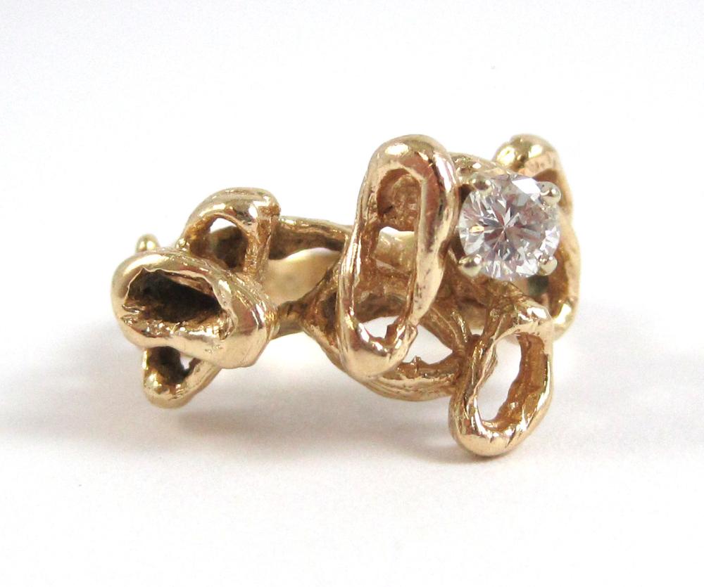 DIAMOND AND FOURTEEN KARAT GOLD