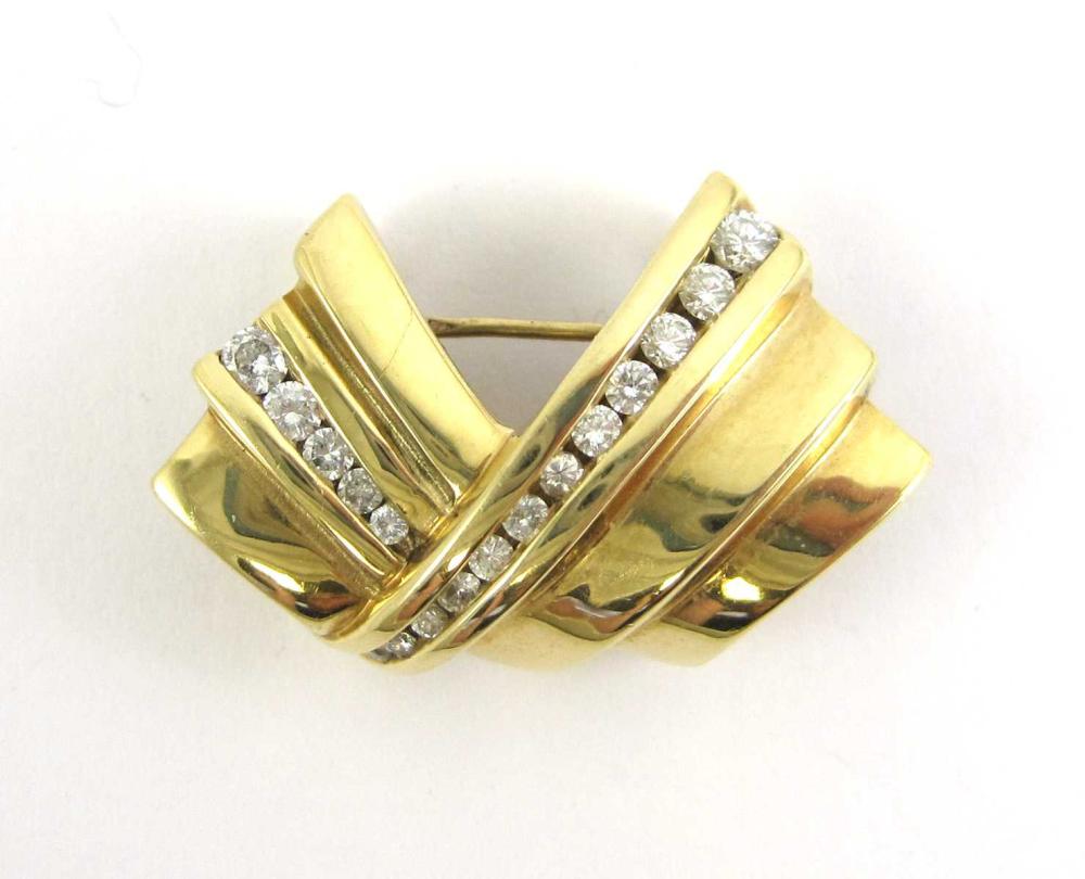 DIAMOND AND FOURTEEN KARAT GOLD