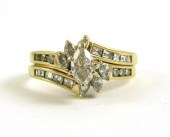 DIAMOND AND FOURTEEN KARAT GOL