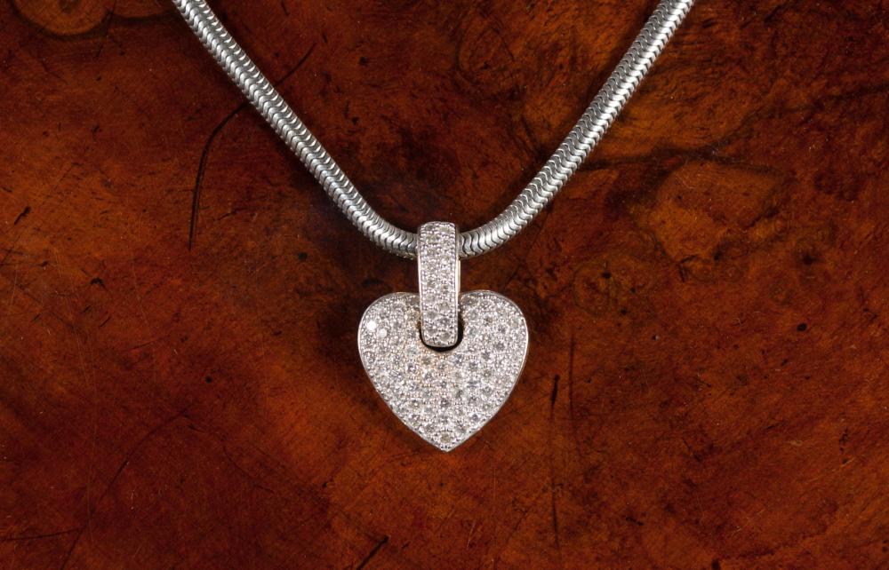 DIAMOND AND FOURTEEN KARAT GOLD