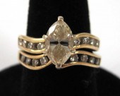 DIAMOND AND FOURTEEN KARAT GOL