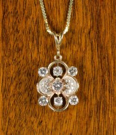 DIAMOND AND FOURTEEN KARAT GOL