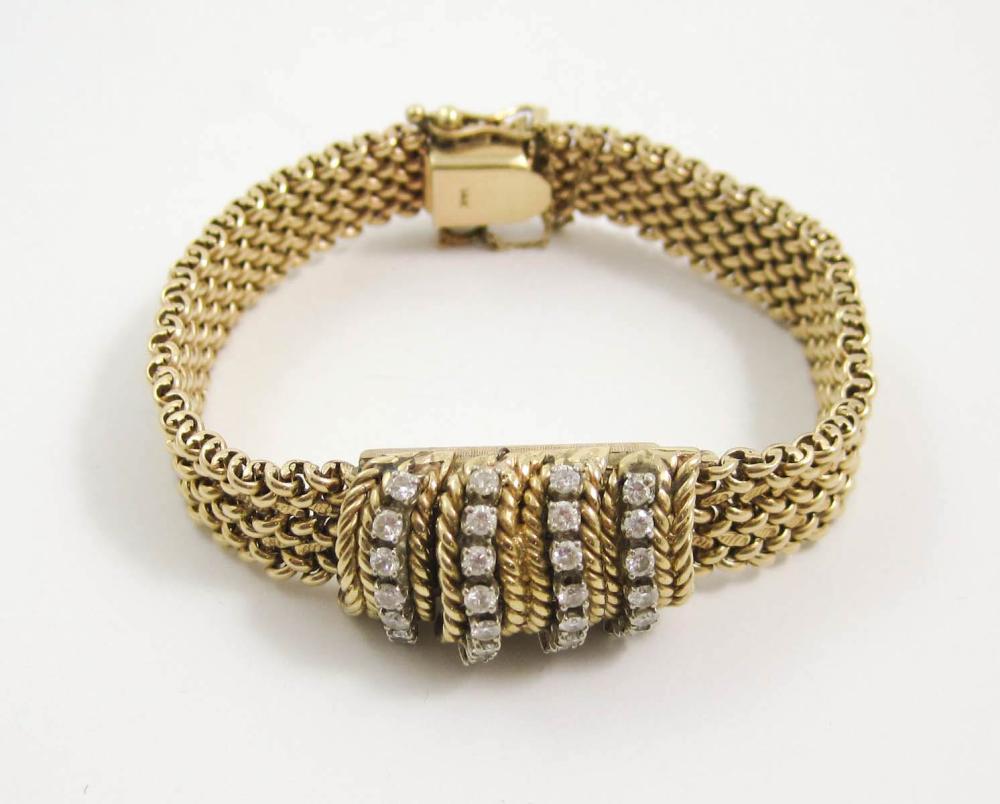 DIAMOND AND FOURTEEN KARAT GOLD