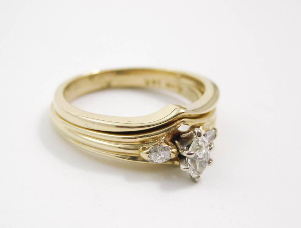 DIAMOND AND FOURTEEN KARAT GOLD