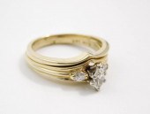 DIAMOND AND FOURTEEN KARAT GOL