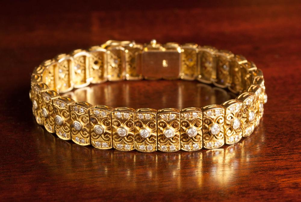 DIAMOND AND FOURTEEN KARAT GOLD