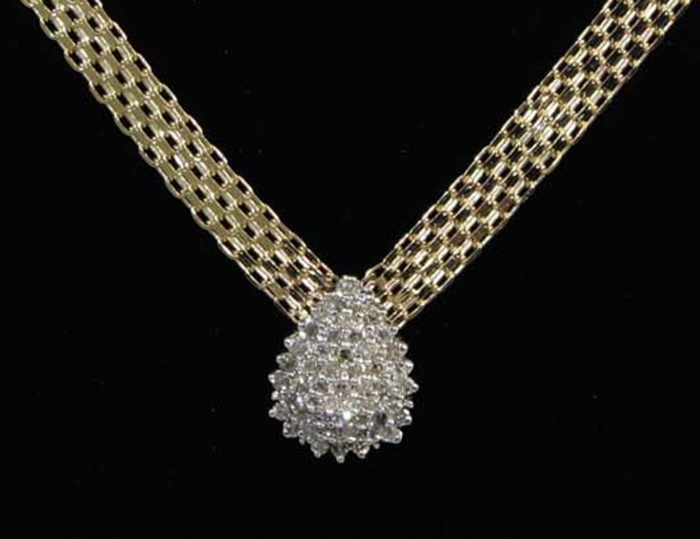 DIAMOND AND FOURTEEN KARAT GOLD