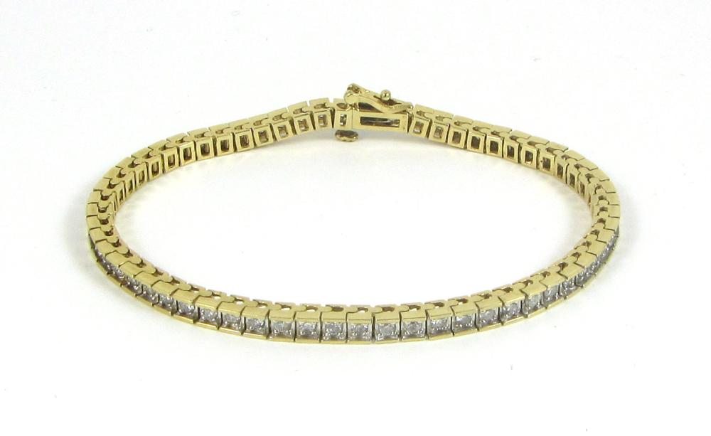 DIAMOND AND FOURTEEN KARAT GOLD