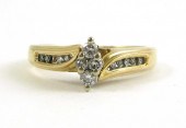 DIAMOND AND FOURTEEN KARAT GOL
