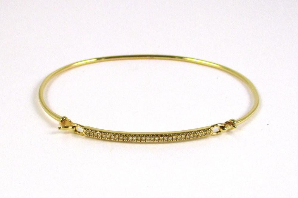 DIAMOND AND FOURTEEN KARAT GOLD