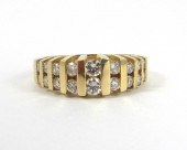 DIAMOND AND FOURTEEN KARAT GOL
