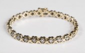 DIAMOND AND FOURTEEN KARAT GOL