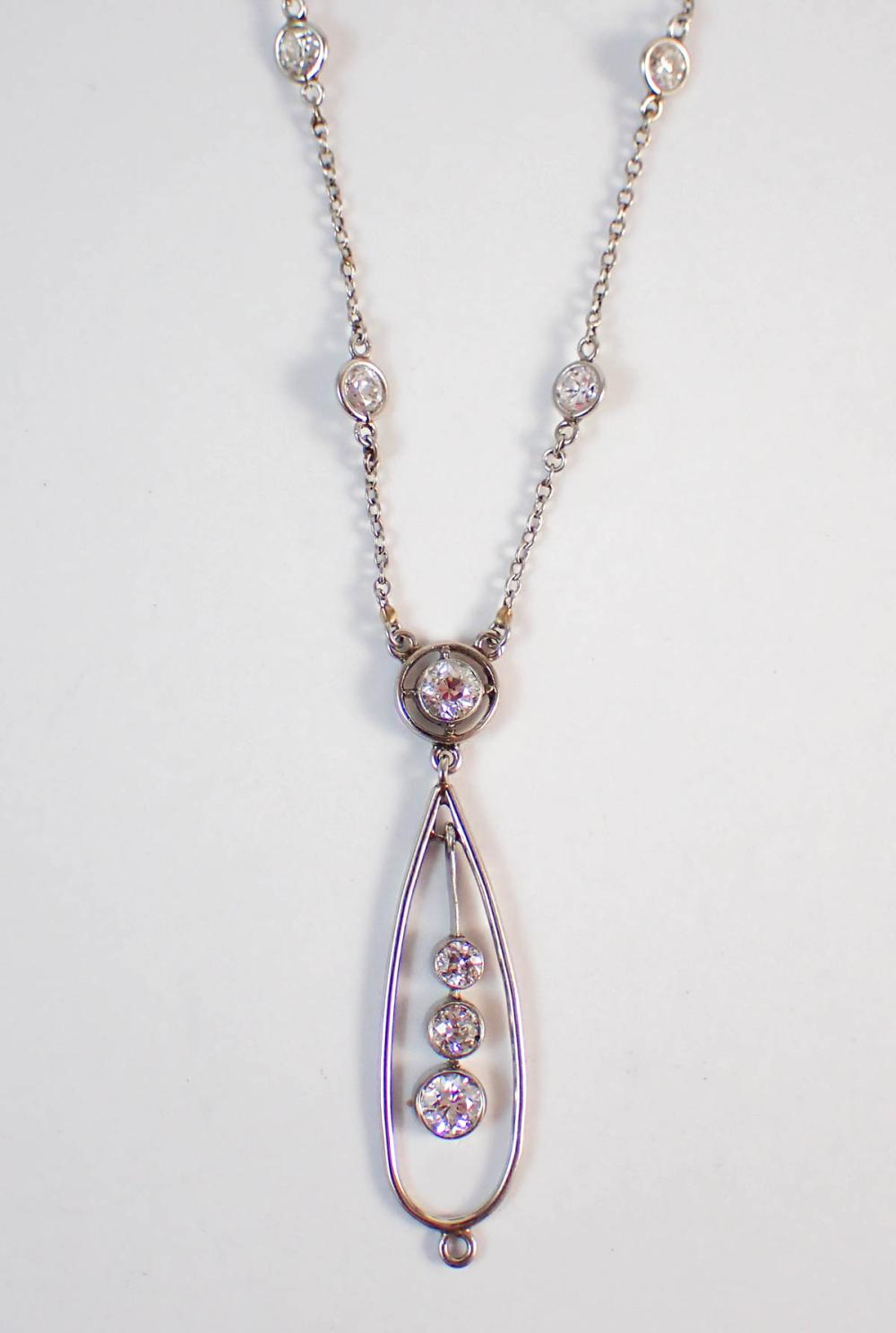 DIAMOND AND FOURTEEN KARAT GOLD
