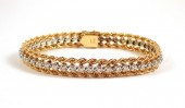 DIAMOND AND FOURTEEN KARAT GOL