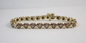 DIAMOND AND FOURTEEN KARAT GOL