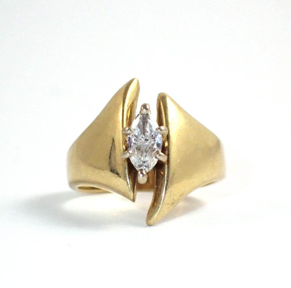 DIAMOND AND FOURTEEN KARAT GOLD