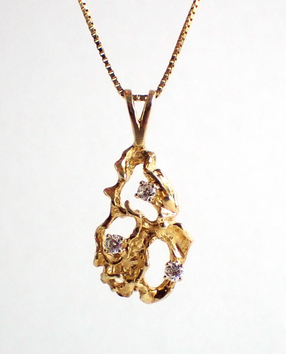 DIAMOND AND FOURTEEN KARAT GOLD