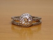 DIAMOND AND FOURTEEN KARAT GOL
