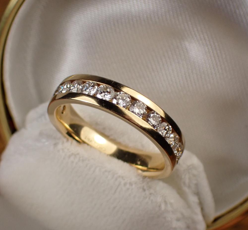 DIAMOND AND FOURTEEN KARAT GOLD