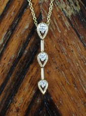 DIAMOND AND FOURTEEN KARAT GOL
