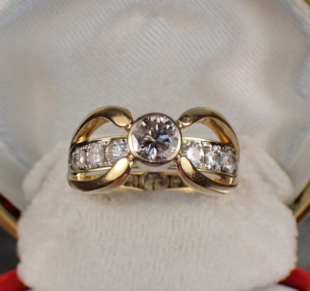 DIAMOND AND FOURTEEN KARAT GOLD